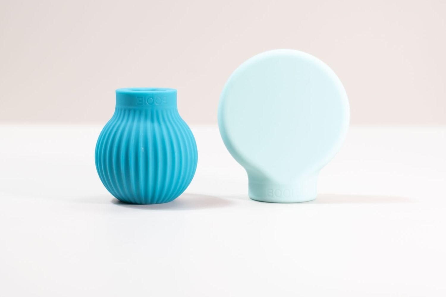 Betty and Margie accessible makeup tools on marble background — silicone ergonomic beauty applicators